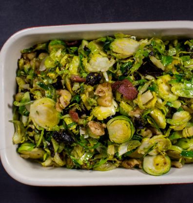 Pan fried Brussels with bacon, prunes and walnuts
