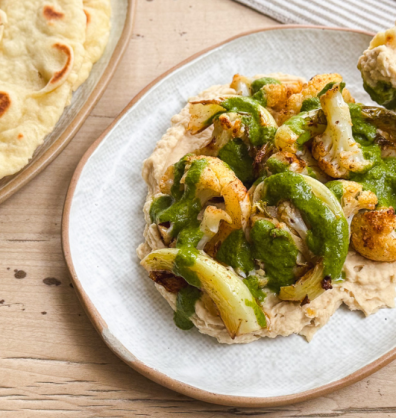 Baharat roasted cauliflower with a butterbean hummus and coriander dressing