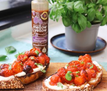 blackberry vinaigrette roasted tomatoes on whipped feta