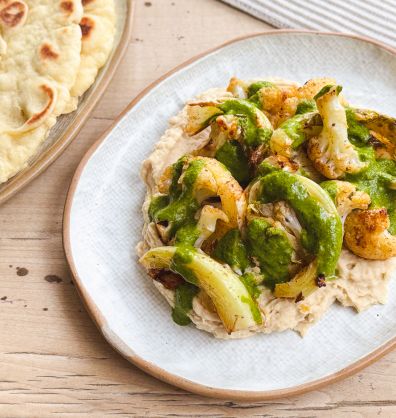 Baharat Roasted Cauliflower with butterbean hummus & coriander dressing