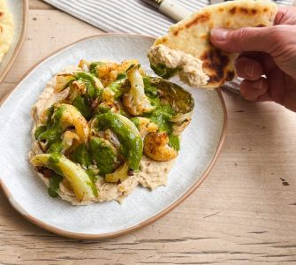 Baharat Roasted Cauliflower with butterbean hummus & coriander dressing